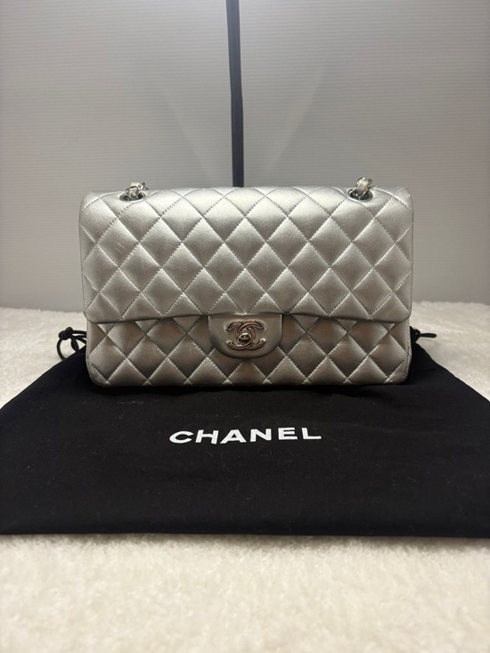 CHANEL Handbags - Chanel Quilted Medium Classic Flap Bag in Silver Lambskin Silver Hardware